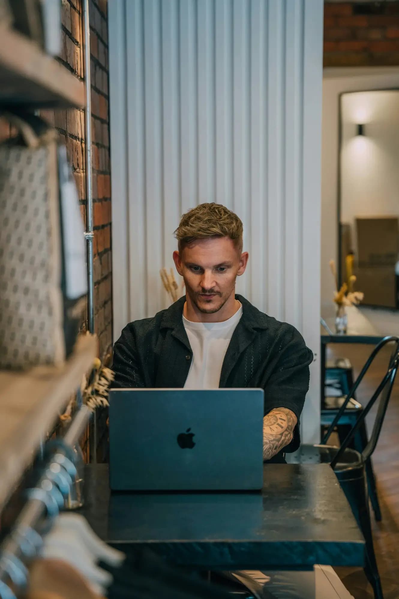 Home services owner reviewing feedback on a laptop